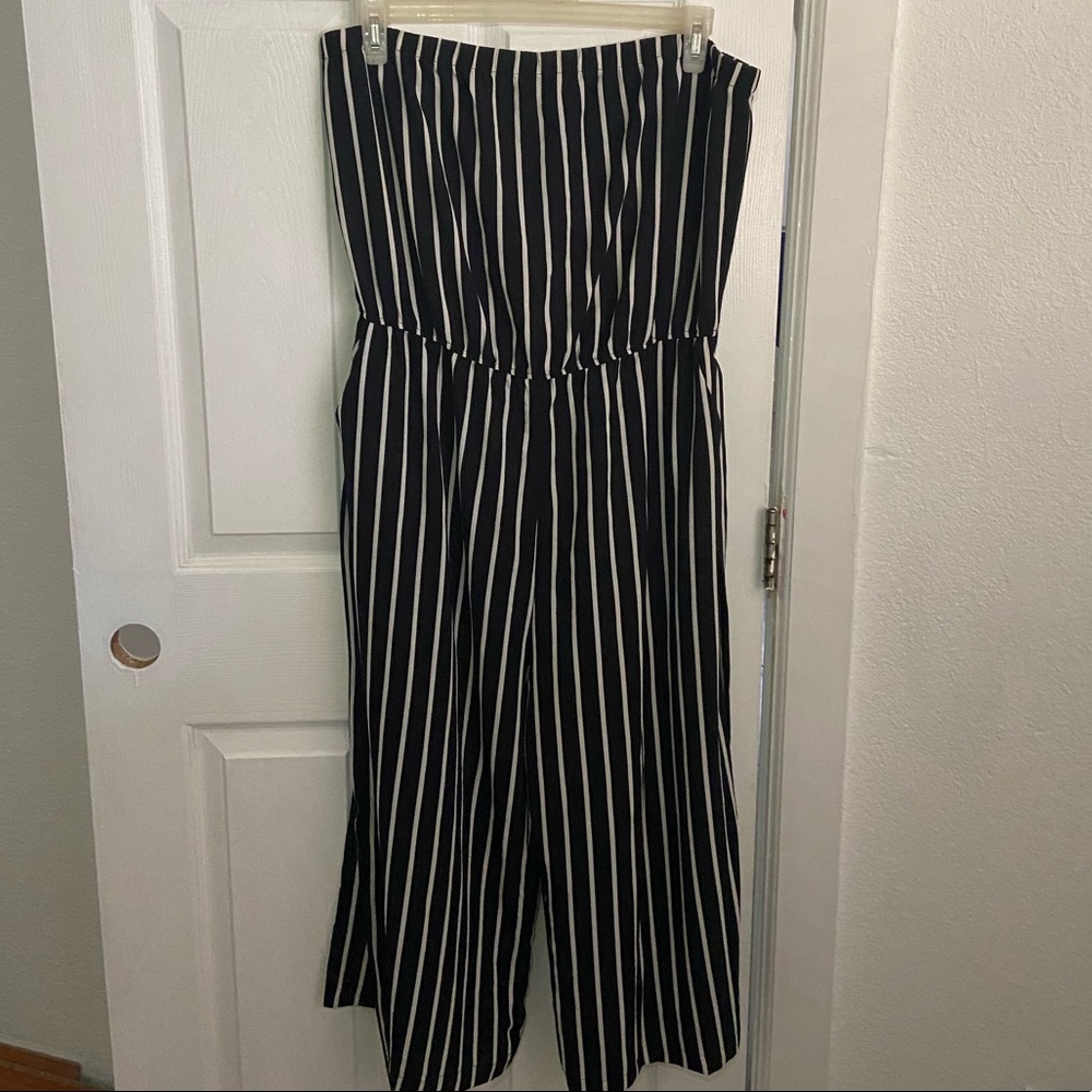 Plus size long romper worn Once. Black and white stripes with pockets and belt